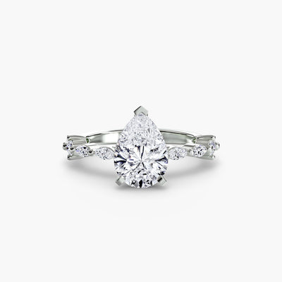 White gold pear-shaped diamond engagement ring with marquise side stones in a classic setting.